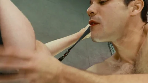 Two guys with tattoos are enjoying hot oral action